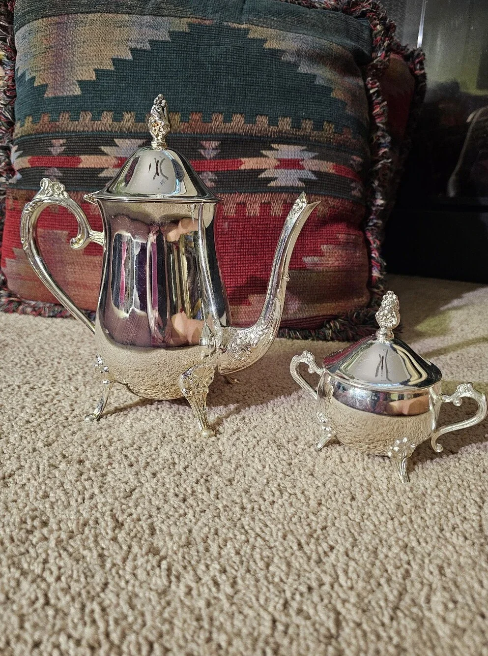 Vintage silverplated coffee/tea pot and covered sugar bowl set.